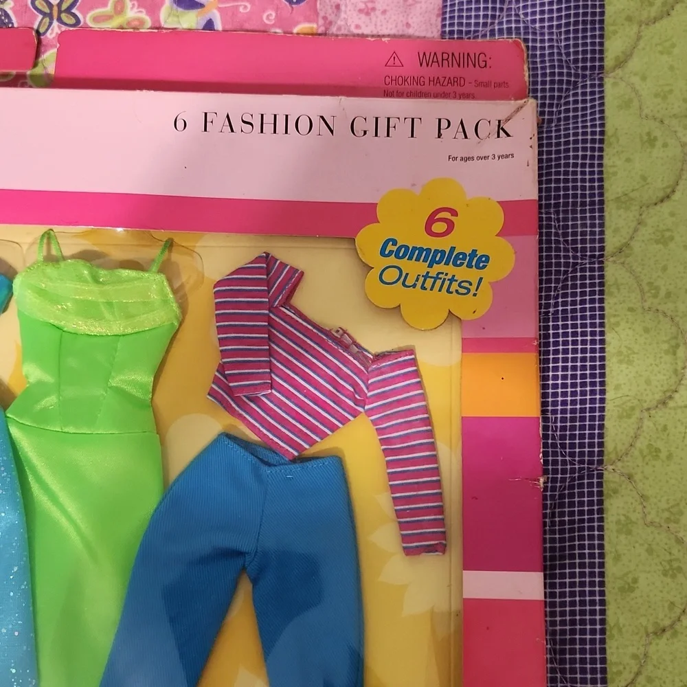 Brand New never opened Barbie fashions.